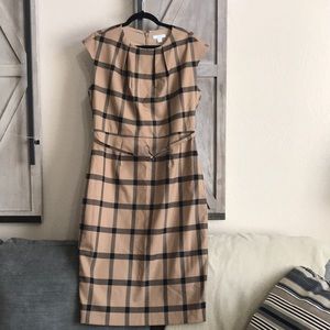 Tan and black women’s dress